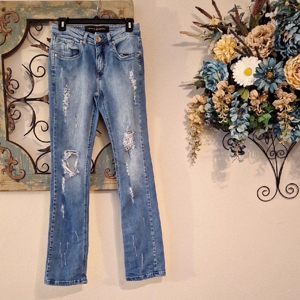 Distressed & Ripped Light Blue Jeans.  NWOT Size 27